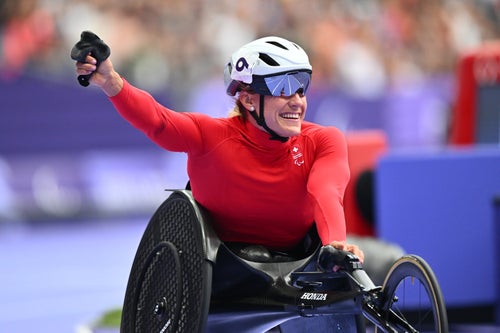 Catherine Debrunner of Team Switzerland celebrates after winning the Gold Medal in Women's 5000m T13 on day three of the Paris 2024 Summer Paralympic Games at Stade de France on August 31, 2024 in Paris, France.