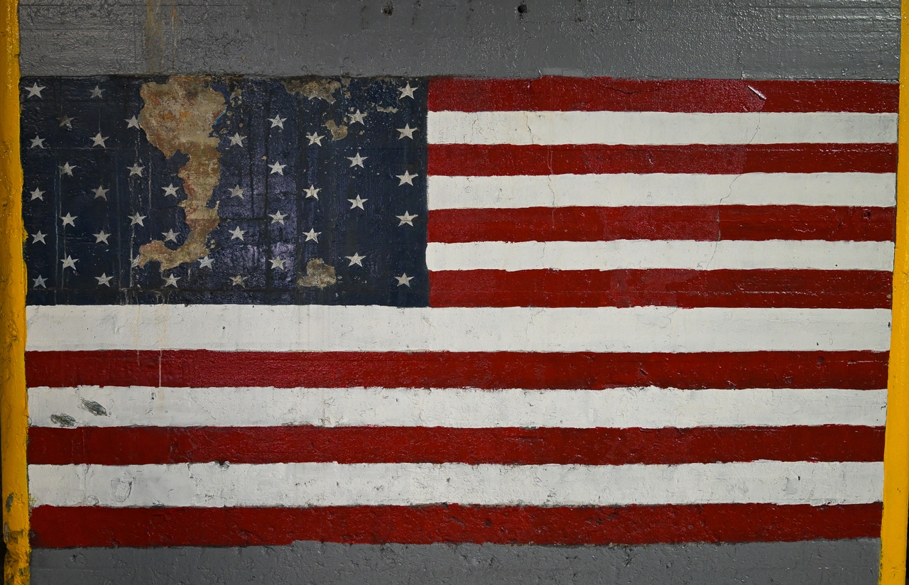 An American flag painted by workers during either the Korean War or Vietnam War is pictured in the basement of the Scranton Army Ammunition Plant.