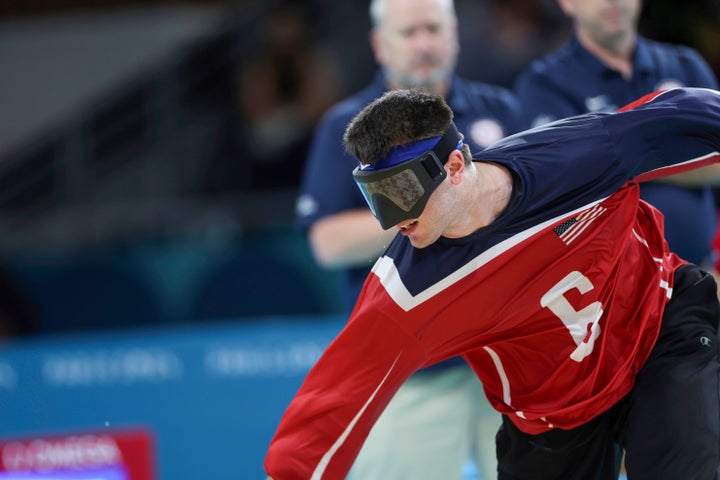 Sweat drops from Calahan Young, U.S. goalball team captain, as he throws the ball during a match against Brazil on Friday, August 30, 2024 at the South Paris Arena during the Paralympic Games in Paris. (Photo/ Nathalee Simoneau)