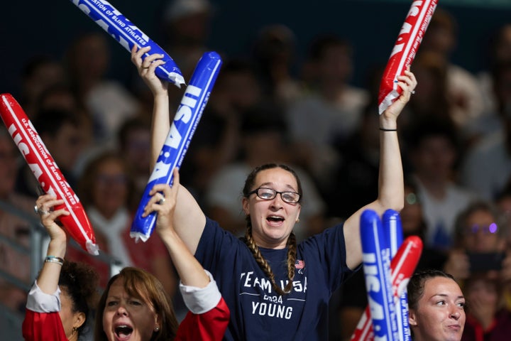 Eliana Mason, an American goalball Paralympian, cheers on fiancé Calahan Young, during a match between the U.S. and Brazil mens' goalball teams on Friday, August 30, 2024 at the South Paris Arena during the Paralympic Games in Paris. Young is the U.S. men's team captain. Brazil won the match 13-8. (AP Photo/Nathalee Simoneau)