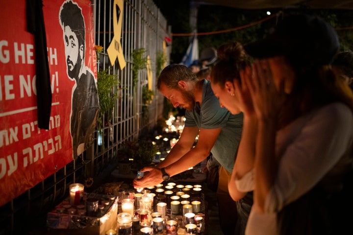 People light candles during a vigil in memory of slain hostage Hersh Goldberg-Polin in Jerusalem, Israel, on Sunday.