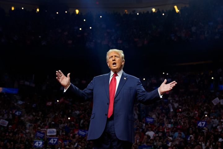 Republican presidential nominee former President Donald Trump arrives for a campaign rally at the Desert Diamond Arena, Friday, Aug. 23, 2024.