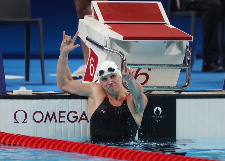 Christie Raleigh Crossley celebrates her world record.