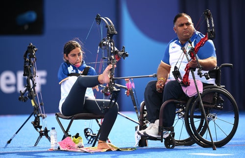 Devi and Rakesh Kumar during the mixed team competition.