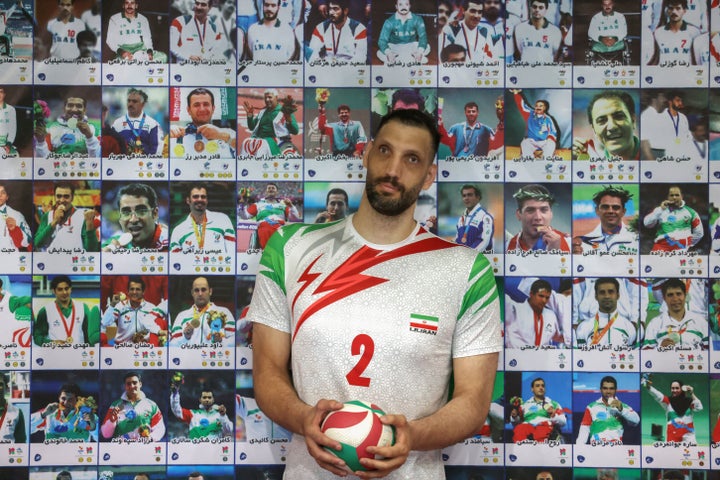 Mehrzad poses for a picture ahead of a training session of Iran's national sitting volleyball team in Tehran on July 20.