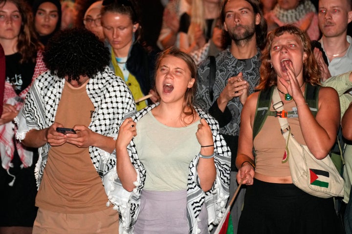 Swedish climate activist Greta Thunberg, center, participates in a march from the University of Copenhagen to Vor Frue Square in Copenhagen, Denmark, on Sept. 4, 2024.