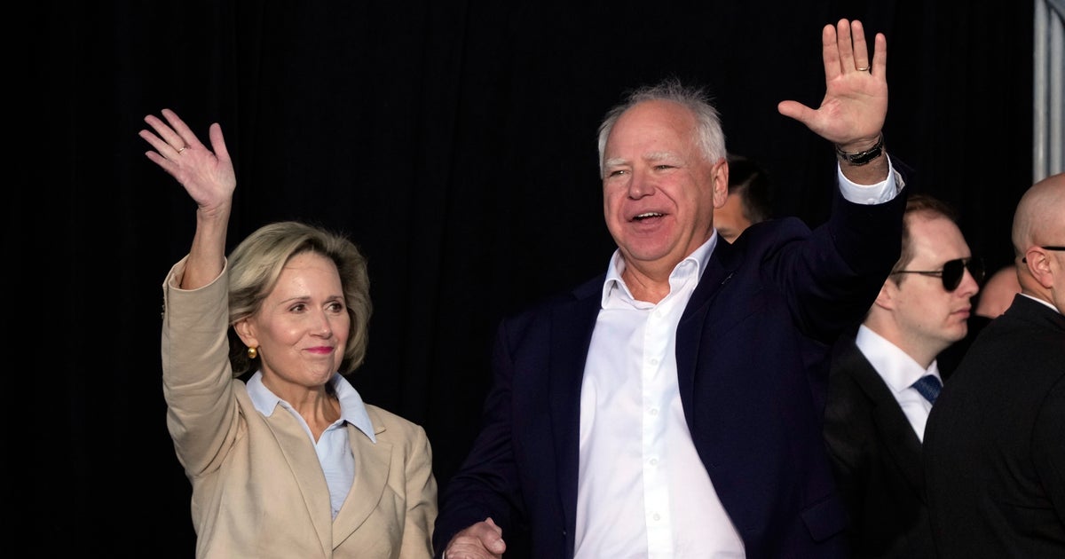NextImg:Tim Walz's Distant Relatives Pose For 'Nebraska Walz's For Trump' Pic