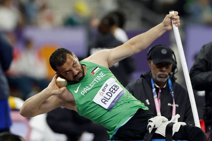 Fadi Aldeeb throws during the shot put finals at the Paralympic Games in Paris on Friday, Aug. 30, 2024. (AP Photo/Nathalee Simoneau)