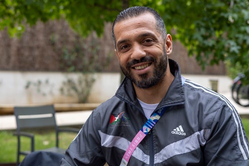 Palestinian athlete Fadi Aldeeb poses for a photograph outside the athletes' village at the Paralympic Games in Paris, Tuesday, Sept. 3, 2024. (AP Photo/Ciarán Fahey)