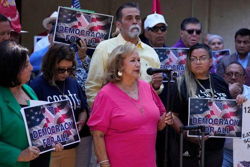 Lydia Martinez, a volunteer and great-grandmother whose home was searched, speaks at a news conference where she and officials with the League of United Latin American Citizens responded to allegations by Texas Attorney General Ken Paxton on Aug. 26, 2024, in San Antonio.