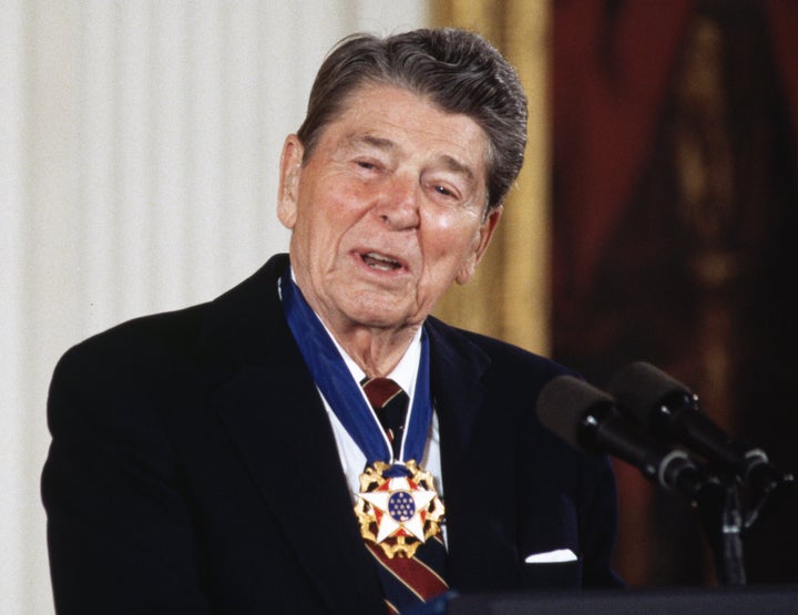 President Ronald Reagan speaks after recieving the Presidential Medal of Freedom in 1993. In an interview with actor Dennis Quaid, journalist Chris Wallace said he thinks Reagan would be "appalled" by Donald Trump's behavior.