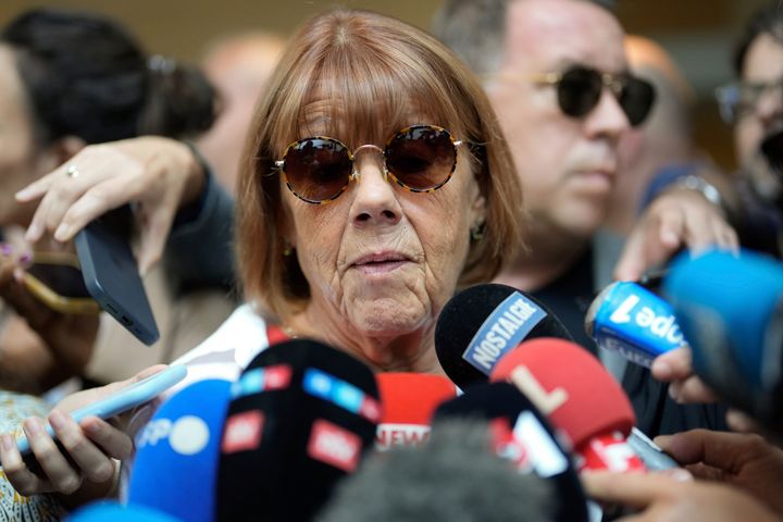 Gisele Pelicot speaks to media as she leaves an Avignon, France, courthouse, Sept. 5, 2024. Her ex-husband admitted to repeatedly drugging her and inviting at least 80 men to rape her while she was unconscious between 2011 and 2020.