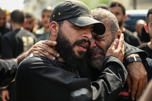 Mourners react during the funeral procession of Palestinians killed in an Israel raid on the northern part of occupied West Bank, in the Jenin refugee camp on Sept. 6, 2024.