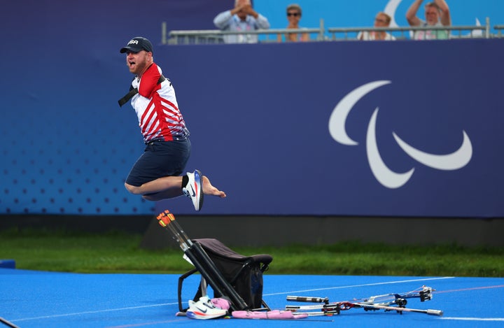 Stutzman celebrates his victory in the Para Archery men's individual compound open semifinal on Sunday.