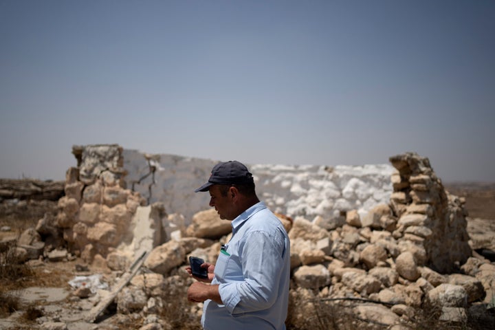 Fayez Suliman Tel, caput of nan colony assembly for Khirbet Zanuta, stands adjacent to a location that was destroyed erstwhile his organization was driven retired by Israeli settlers, Tuesday, Aug. 27, 2024. (AP Photo/Maya Alleruzzo)