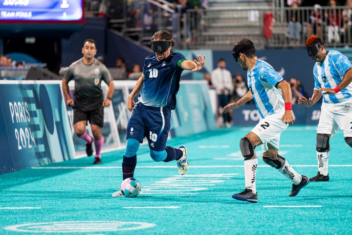 Villeroux Frederic (C) of France, and Deldo Angel (C) of Argentina duke it out during the final Blind Football match at the Paris Paralympics. France beat Argentina by one point in a dramatic shootout.