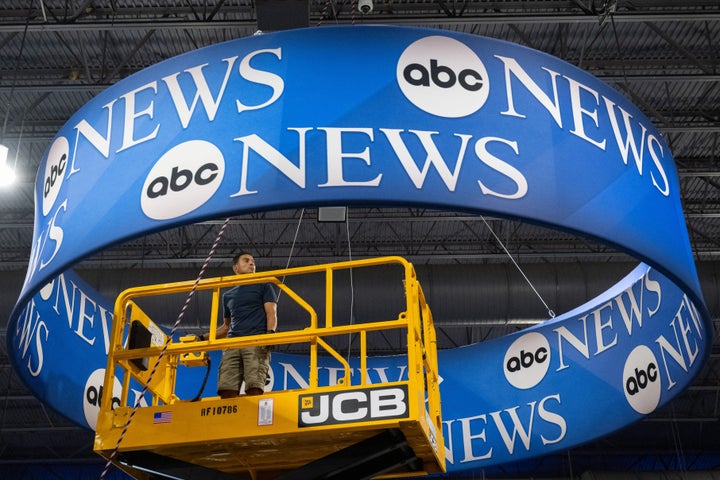 Workers complete preparations on the media filing center and spin room for the ABC News Presidential Debate on Tuesday between Democratic nominee Kamala Harris and Republican nominee Donald Trump in Philadelphia. With less than two months until Election Day, the debate could be a turning point in the close contest.