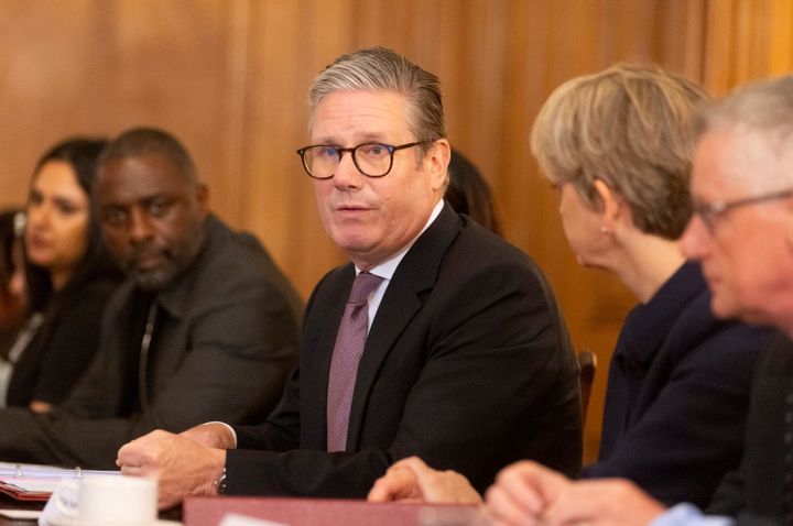 Keir Starmer, speaks near the actor Idris Elba, left, during a knife crime summit at 10 Downing Street yesterday.