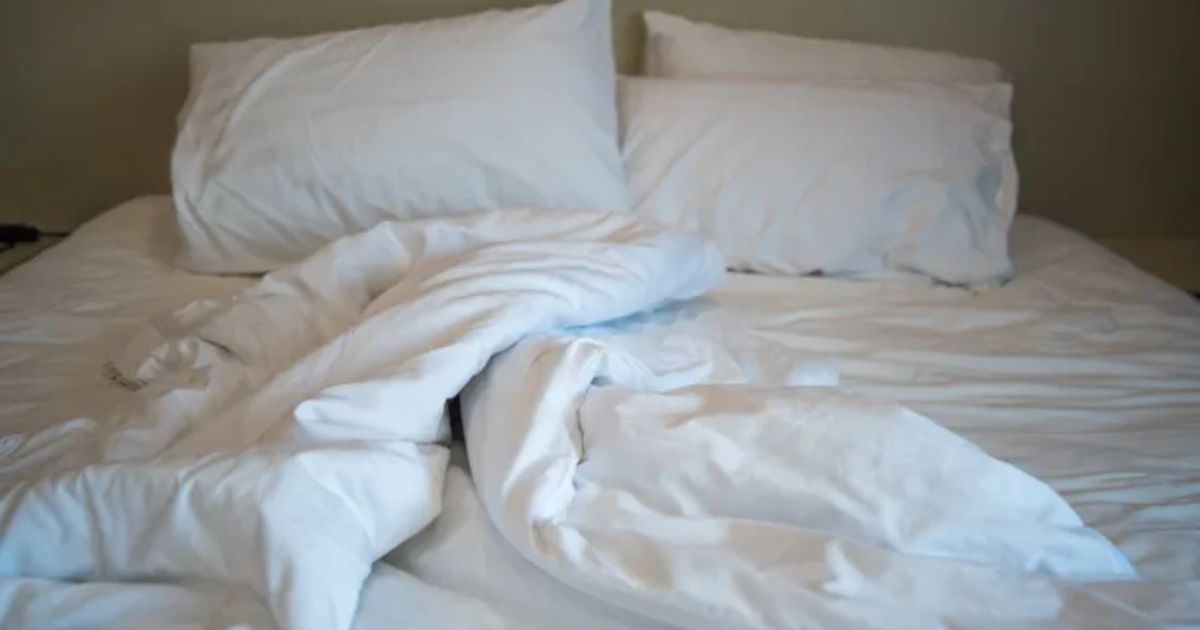 Here’s The Exact Temperature A Sleep Expert Says Your Bedroom Should Be