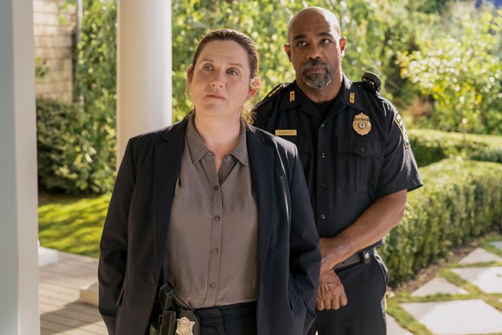 Donna Lynne Champlin as Nikki Henry and Michael Beach as Dan Carter in the final episode of Netflix's "The Perfect Couple."