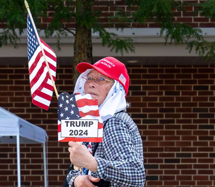 A woman waits to enter a rally for Trump on July 31 in Harrisburg, Pennsylvania.