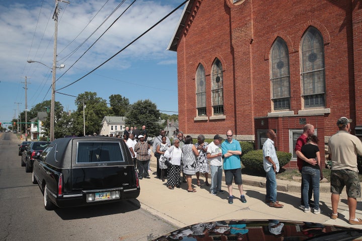 Mourners line up to attend the visitation of Derrick Fudge at St. John Missionary Baptist Church on Aug. 10, 2019 in Springfield, Ohio. The city has become home to many immigrants from Haiti fleeing political upheaval and rule by violent gangs in their home country.