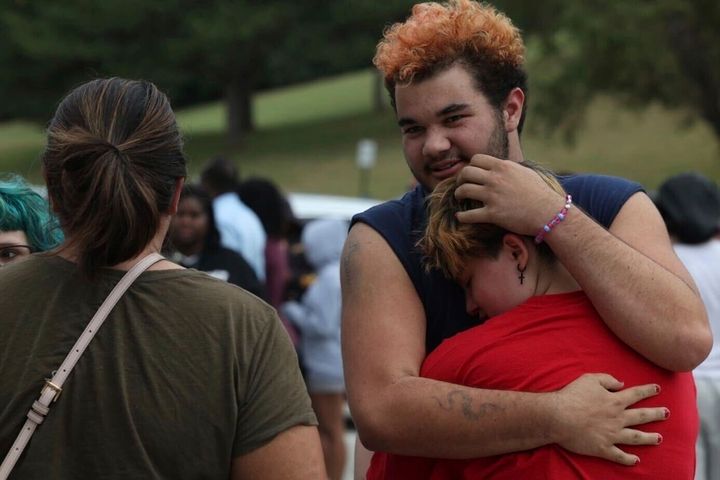 Artemis Else, right, hugs Angie Caswell as they wait outside Northwest High School after a shooting was reported Tuesday, Sept. 10, 2024, in Omaha, Nebraska.