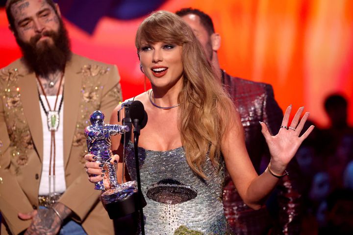 Taylor Swift accepts the Video of the Year award for "Fortnight" on stage during the 2024 MTV Video Music Awards.