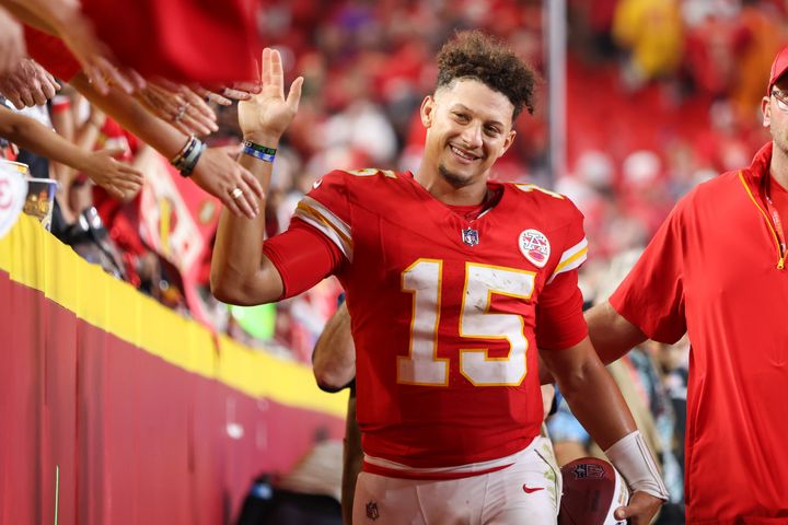 Kansas City Chiefs quarterback Patrick Mahomes, pictured celebrating a recent victory, says he's staying mum on his presidential choice.