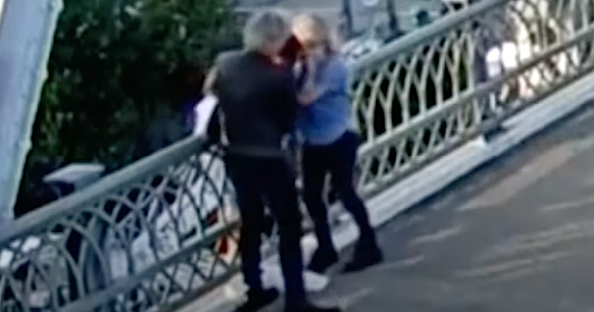 NextImg:Jon Bon Jovi Helps Talk Woman Off Bridge Ledge And Gives Her A Hug