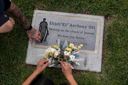 Mikayla Brown and her husband, Tyler, visit the grave of their son, Elijah, who died of a fentanyl overdose at 15, in Paso Robles, California, Friday, Aug. 2, 2024.