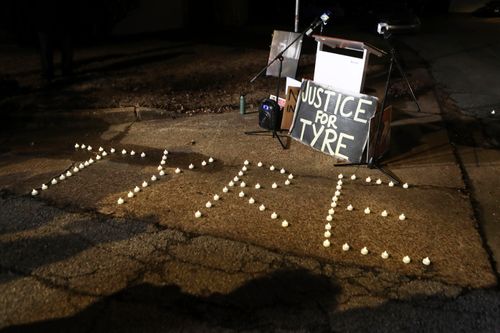 Candles spell out Tyre Nichols' name on the anniversary of his death, Jan. 7, 2024, in Memphis. In March 2024, a judge indefinitely postponed the state court trial of four former Memphis officers charged with second-degree murder in the fatal beating of Tyre Nichols until after the conclusion of a federal trial.