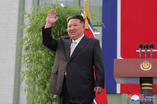 In this photo taken provided by the North Korean government, North Korean leader Kim Jong Un waves to the displaced residents from the flood-hit areas, on their arrival in Pyongyang, North Korea on Aug. 15, 2024. Independent journalists were not given access to cover the event depicted in this image distributed by the North Korean government. The content of this image is as provided and cannot be independently verified. Korean language watermark on image as provided by source reads: "KCNA" which is the abbreviation for Korean Central News Agency. (Korean Central News Agency/Korea News Service via AP)