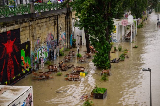 VIENNA, AUSTRIA - SEPTEMBER 15: A flooded restaurant at the Danube Chanel during heavy rain on September 15, 2024 in Vienna, Austria. There have been extreme weather and flood warnings as heavy rainfall sweeps the Czech Republic, Poland, Germany, Austria and Slovakia. (Photo by Christian Bruna/Getty Images)