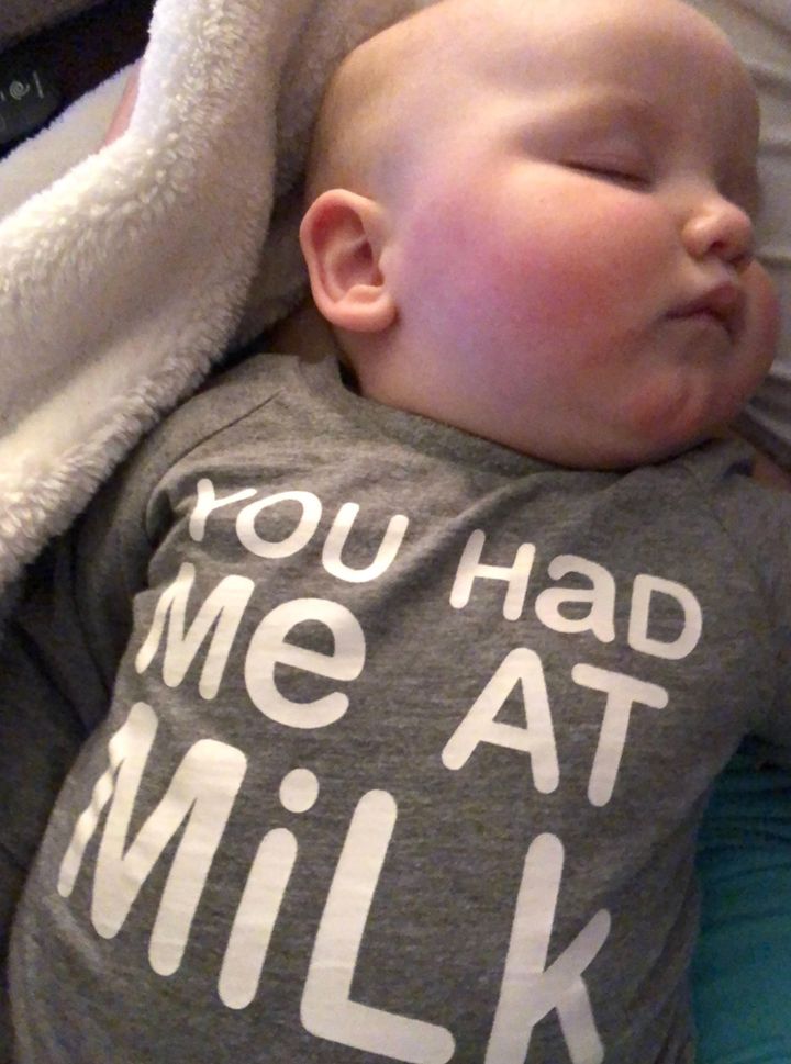 The author's son sleeping after a bottle of breast milk.