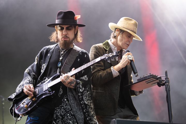 Jane's Addiction's Dave Navarro (left) and Perry Farrell (right) perform in Dublin, Ireland, on June 28. The band announced they were canceling the rest of their tour on Monday, days after lead singer Ferrell threw a punch at his guitarist on stage in Boston.