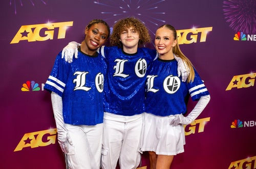 Emily Gold (right) with other members of the Los Osos High School dance group at the red carpet for the quarterfinals last month.