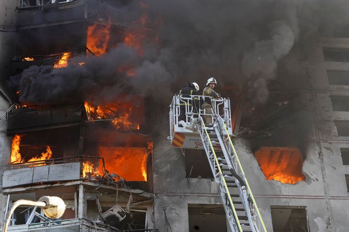 Firefighters tackle a blaze after a Russian aerial bomb struck a multi-story residential building in Kharkiv last Sunday.