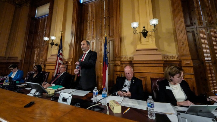 Georgia's State Election Board members discuss proposals for election rule changes at the state capitol on Sept. 20, 2024, in Atlanta. 