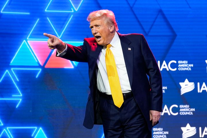 Republican presidential nominee former President Donald Trump acknowledges the crowd after speaking at the Israeli American Council National Summit, Thursday, Sept. 19, 2024, in Washington.