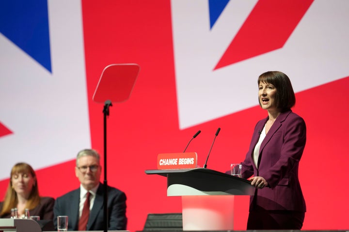 Keir Starmer and Angela Rayner look on as Rachel Reeves delivers her speech to the Labour conference.