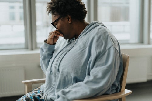 Grief therapists share what unresolved grief looks like so you can identify it and seek the support you need to move forward.
