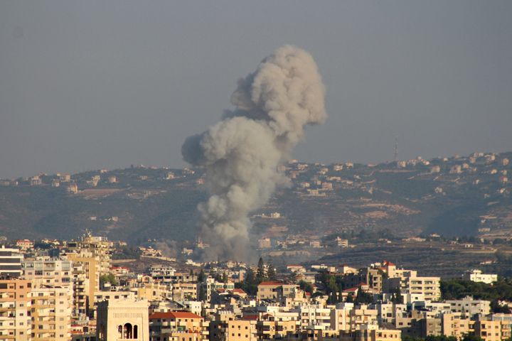 Smoke billows after an Israeli airstrike that targeted the southern Lebanese village of Abbasiyeh on September 24, 2024. (Photo by KAWNAT HAJU/AFP via Getty Images)