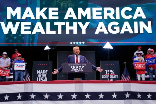 Republican presidential nominee former President Donald Trump speaks about the tax code and manufacturing at the Johnny Mercer Theatre Civic Center, Tuesday, Sept. 24, 2024, in Savannah, Ga. (AP Photo/Evan Vucci)
