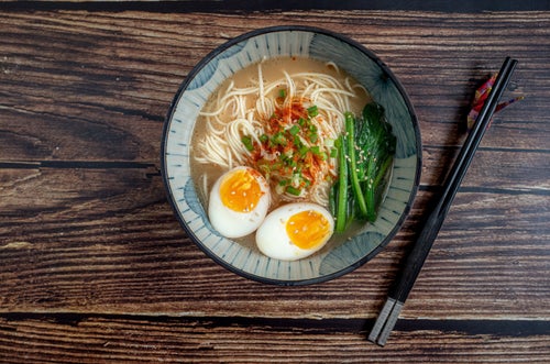 Add a little protein and some vegetables to your instant ramen to pack more nutritional punch.