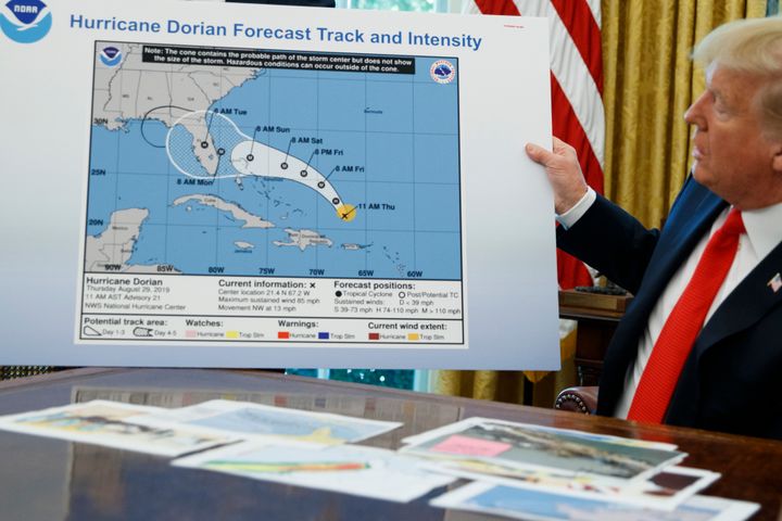 In this Sept. 4, 2019, file photo, then-President Donald Trump holds up a Sharpie-altered forecast map for Hurricane Dorian.