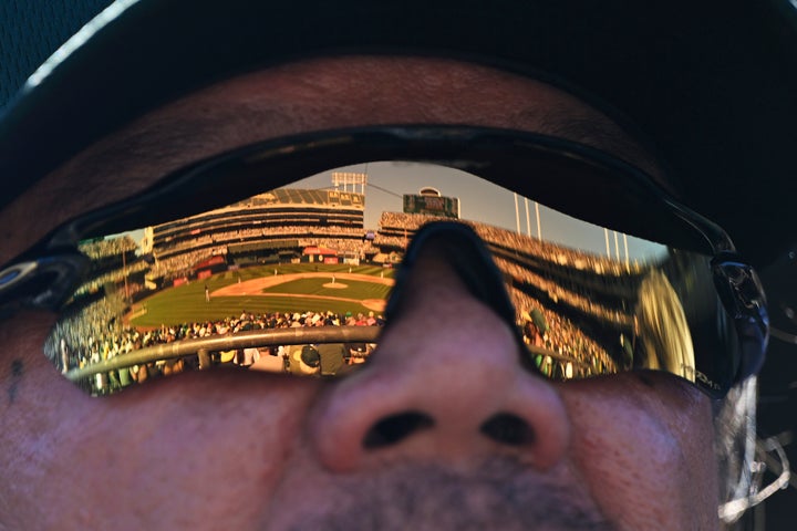 OAKLAND, CALIFORNIA - SEPTEMBER 26: The stadium is reflected in a fans sunglasses during the fifth inning as the Oakland Athletics play the Texas Rangers at the Oakland Coliseum on September 26, 2024 in Oakland, California. (Photo by Eakin Howard/Getty Images)