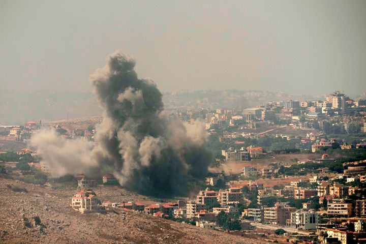 Smoke rises from Israeli airstrikes in the southern village of Kfar Rouman, seen from Marjayoun, south Lebanon.