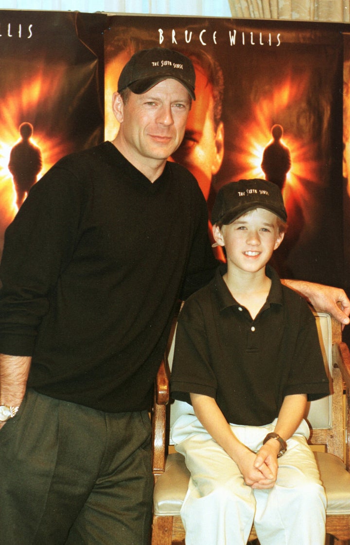 (Original Caption) Bruce Willis with Haley Joel Osment at the preview of the film 'The Sixth Sense'. (Photo by Ronald Siemoneit/Sygma/Sygma via Getty Images)