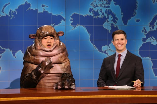 Bowen Yang as Moo Deng the hippo and Colin Jost during Weekend Update on Saturday. 